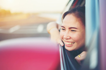 woman smile in car