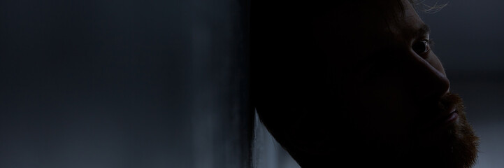 Depressed man in the darkness
