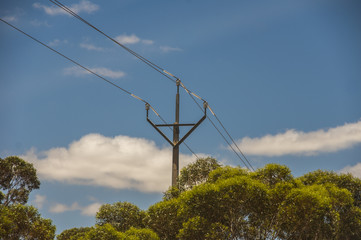 Electricity supply towers and structures transmit power along high voltage wires and cables