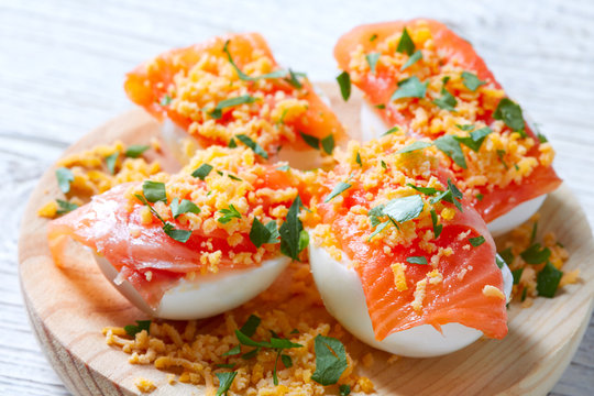 Filled eggs with salmon pinchos tapa Spain