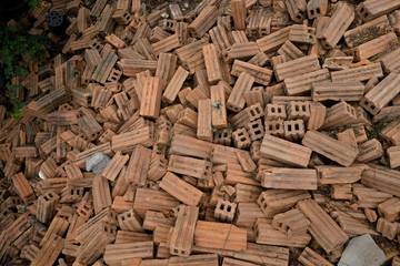 Heap of red brick used background