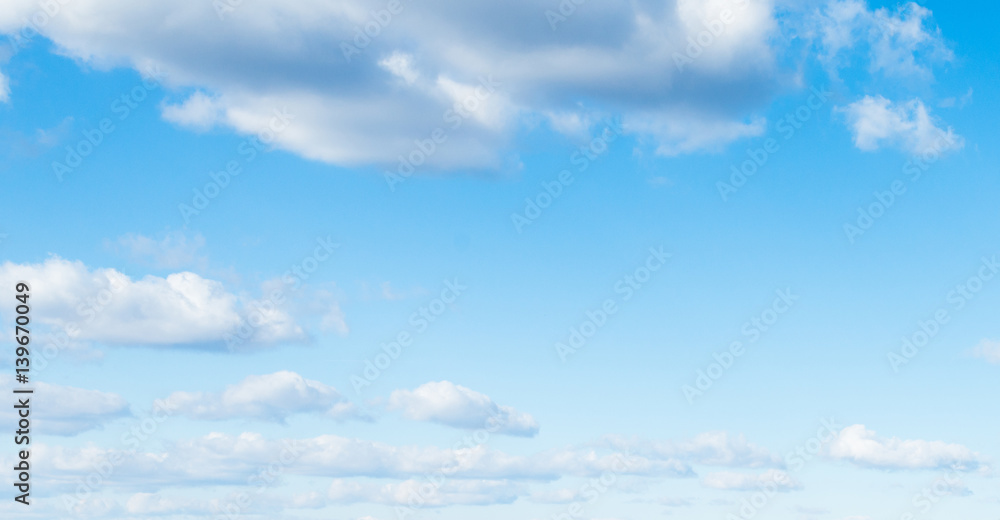 Wall mural blue sky background with clouds