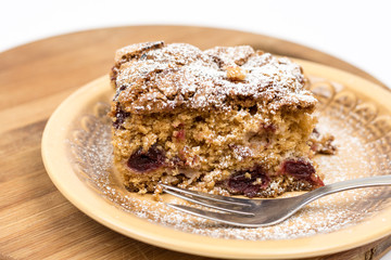 Cherry cake on the plate with copy space