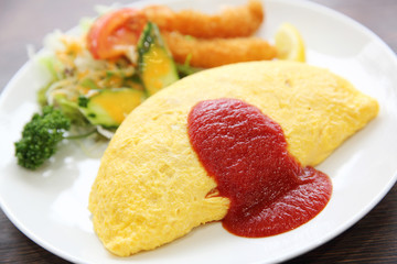 omelette with fried rice and shrimp tempura Japanese food