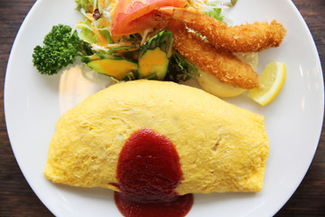omelette with fried rice and shrimp tempura Japanese food