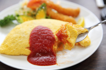 omelette with fried rice and shrimp tempura Japanese food