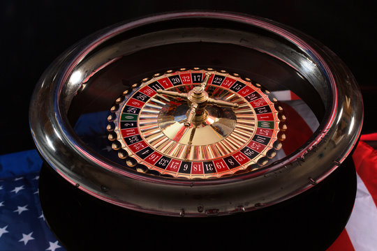 American flag and its reflection in the roulette wheel