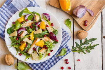 salad with rucola and pomegranate seeds