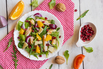 salad with rucola and pomegranate seeds