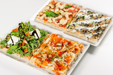 Square pizza served on a plate