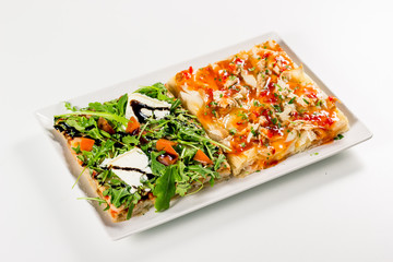 Square pizza served on a plate