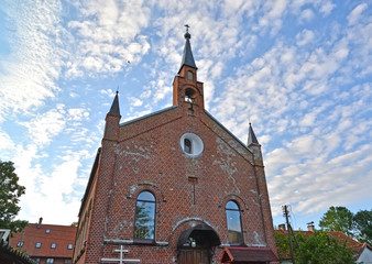 Fototapeta na wymiar Fragment of Church of St. Sergius of Radonezh (former Lutheran church of Rossitten). Kaliningrad region