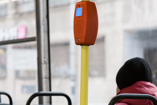 Clsoe-up view of ticket reader onboard a tram