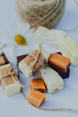 Italian nougat bars cut in pieces on white background