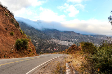 Cinematic road landscape. Humahuaca valley, Altiplano, Argentina. Misty road.