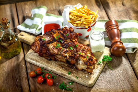 Roasted pork knuckle with french fries