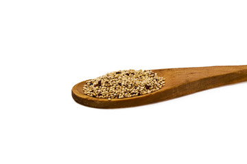 Wooden spoon with quinoa isolated