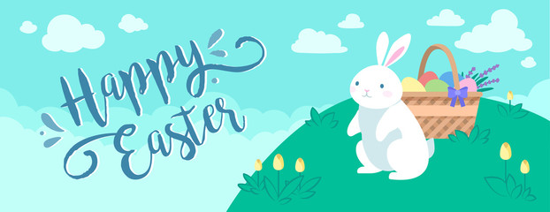 Obraz na płótnie Canvas Happy Easter greeting banner with the white rabbit and the basket of eggs on the lawn on the background with blue sky and clouds. 