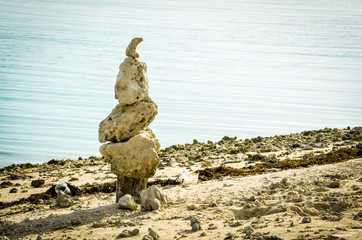 White coral rocks stacked on the beach