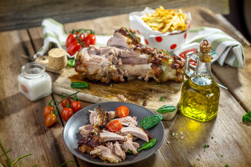 Roasted pork knuckle with french fries
