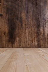 Old rustic wood background. Wooden board template for design. Rough dark plywood texture. Grungy pattern.