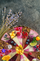 raw vegan cake with fruits and seeds, decorated with flowers, product photography for patisserie