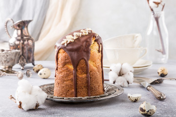 Easter orthodox sweet bread, kulich with chocolate glaze.