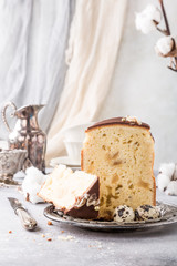 Easter orthodox sweet bread kulich, sliced, with chocolate glaze.
