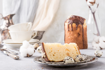 Easter orthodox sweet bread kulich, sliced, with chocolate glaze.