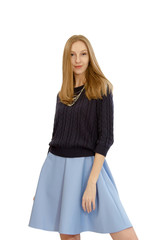 beautiful young blonde girl in blue dress and blouse