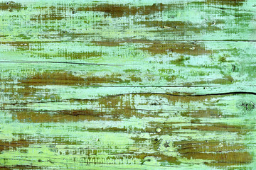 Fototapeta na wymiar aged green painte wood