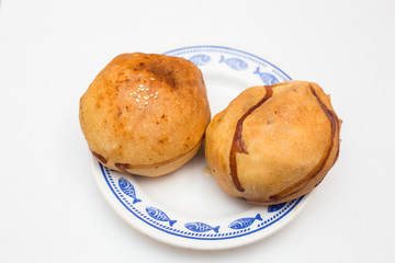 Uzbek national samosa on a plate isolated on a white background