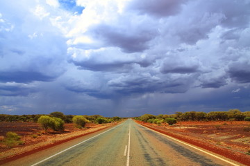 Fototapeta na wymiar Endless Australian highway across the outback