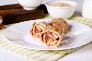 crepes with chocolate filling and banana, horizontal