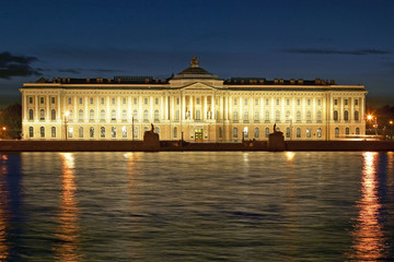 Fototapeta na wymiar Academy of Arts on the river Neva at night in St Petersburg, Russian Federation