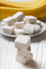 marshmallow and banana on the table