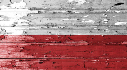 Poland flag on wood texture background with old paint peels