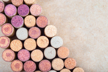 Wine corks background. Used wine corks arranged diagonally on blurred light background. Copy sparse for your text.