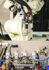 Focus on torch welding head of robot in automotive manufacturer plant