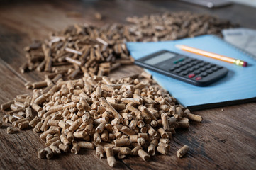 Calculating household heating costs. Wooden pellets, biomass, effective, environmentally friendly...
