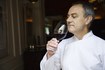 Chef appreciating wine bouquet