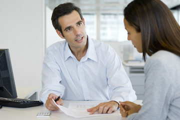 Financial advisor meeting with client