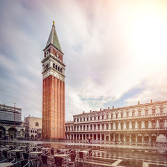 Campanile of St. Mark's Church (Campanile di San Marco) on St. Mark's Square (Piazza san Marco), Venice (Venezia), Italy, Europe, Vintage filtered style with lens flare