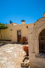 Naklejka premium Monastery (friary) in Messara Valley at Crete island in Greece. Messara - is largest plain in Crete