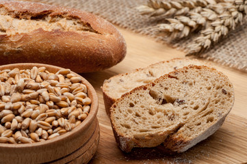 sliced baguette bread on wooden table