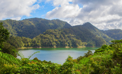 Natural landscape with lake and mountain. Outdoor travel on wild nature.
