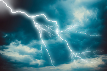 Lightning strike on the dark cloudy sky