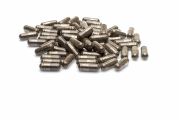 isolated vitamin capsules on white ground