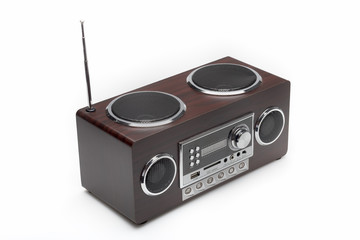 Obraz premium Wooden radio equipment on a white floor