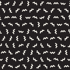 Trendy Texture With Scattered Geometric Shapes. Vector Seamless Pattern.